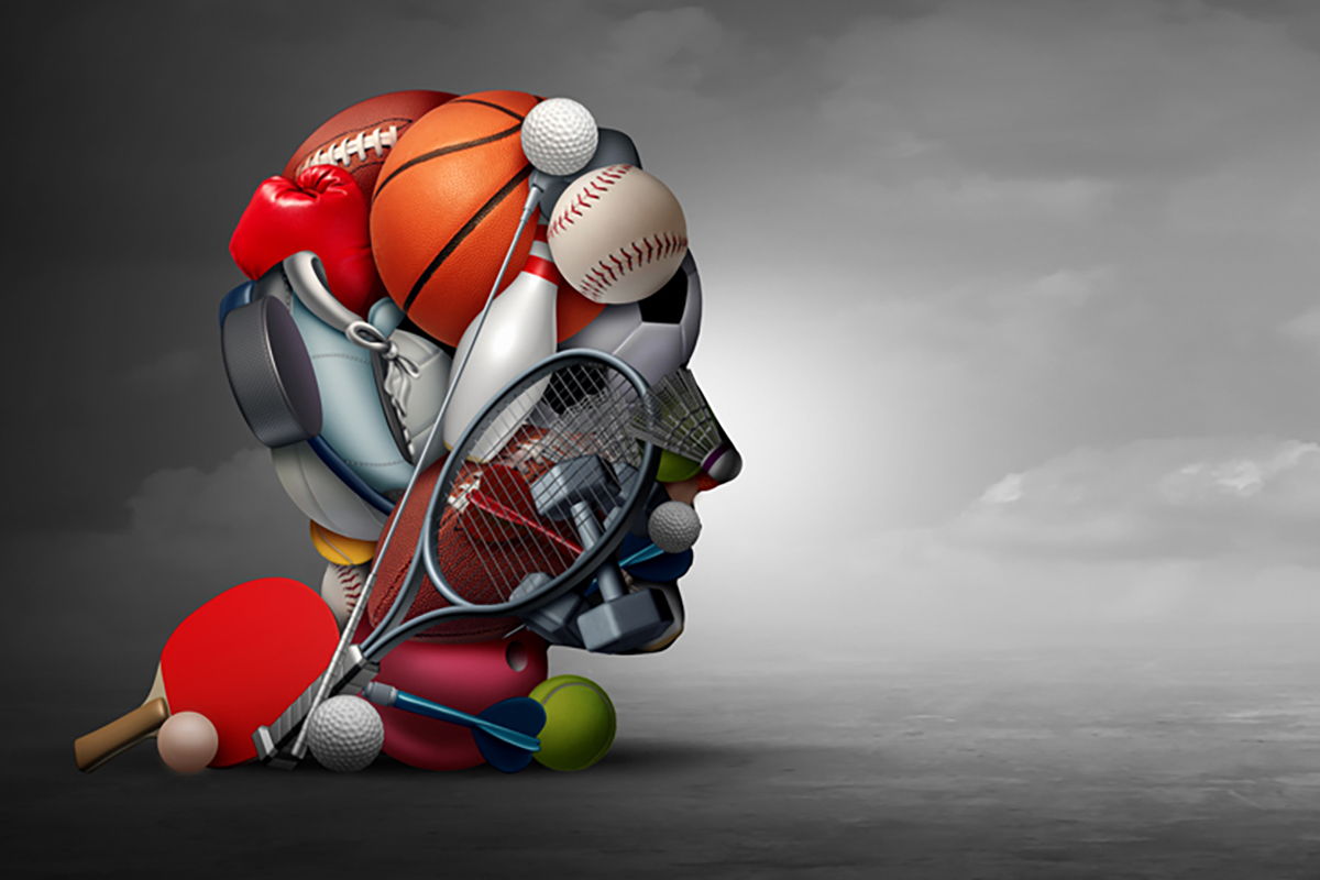  Illustration of a human head formed from sports equipment including a basketball, football, tennis racket and boxing glove