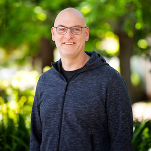Portrait of Brian Granger smiling outdoors.