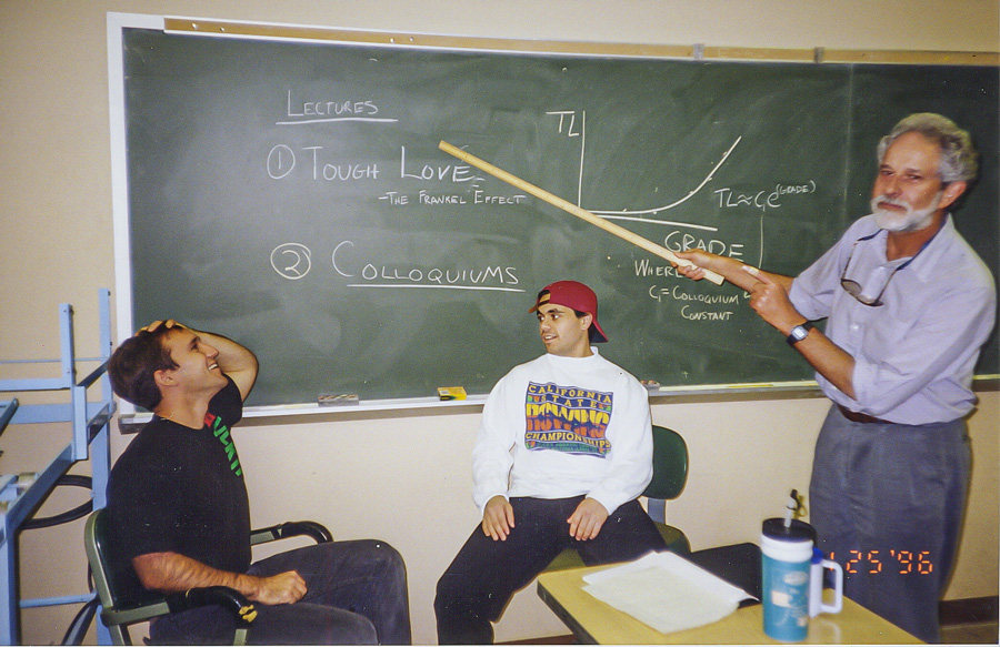 Tony Aghazarian as a Cal Poly student sitting in front of a blackboard.
