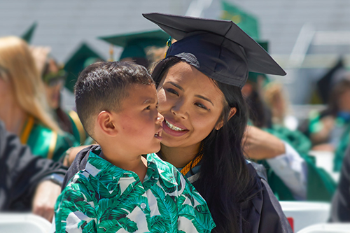 Student with son at commencement