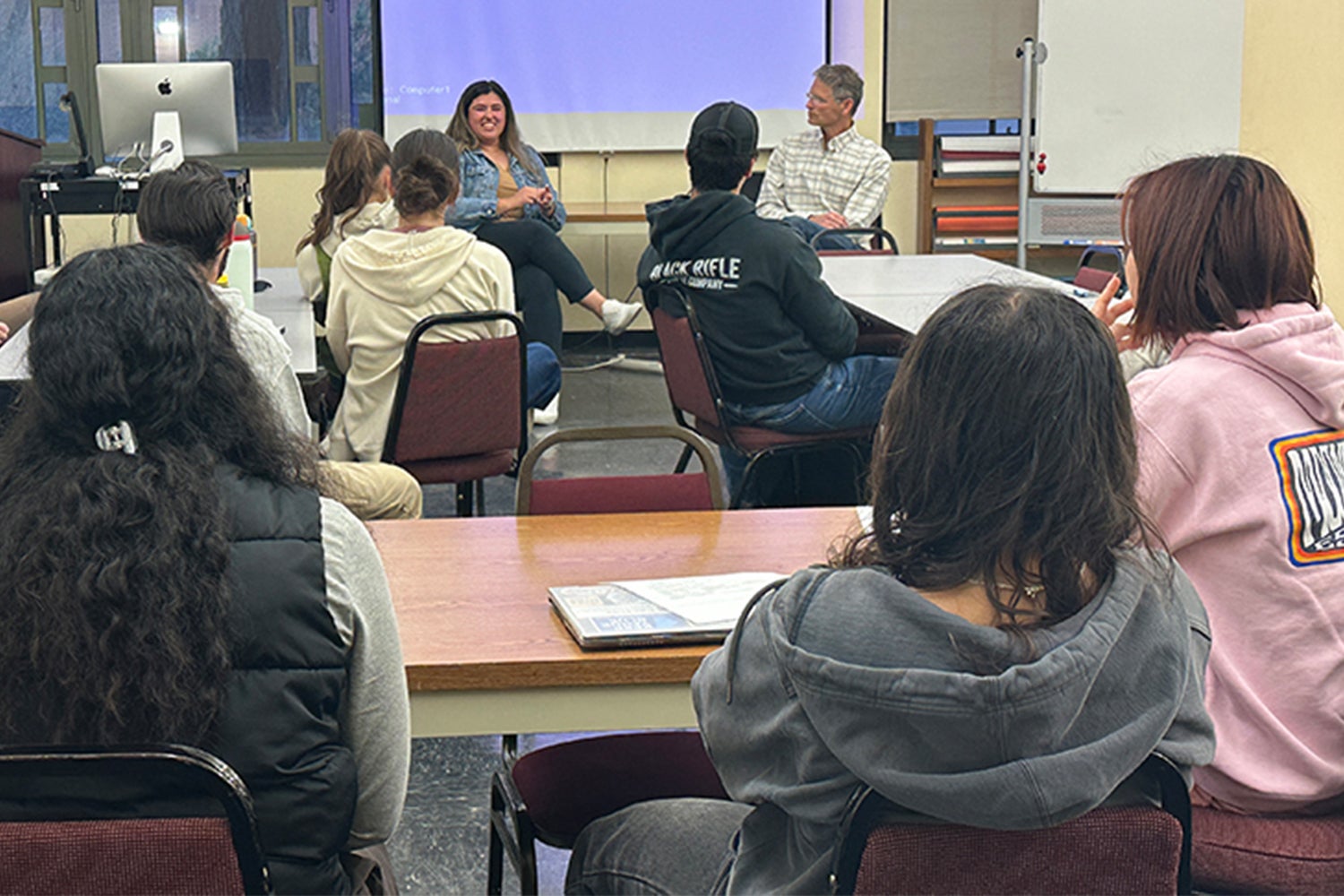 Mariah Chavez, a special education teacher at Rice Elementary School (Santa Maria) and Chance Hoellwarth, the director of Cal Poly CESAME, amid conversation during a "Why I Teach" event.