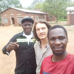 Ryan Marienthal with Victor (solar electric and ISEC teacher) and Joseph (Kindle Orphan Outreach director)