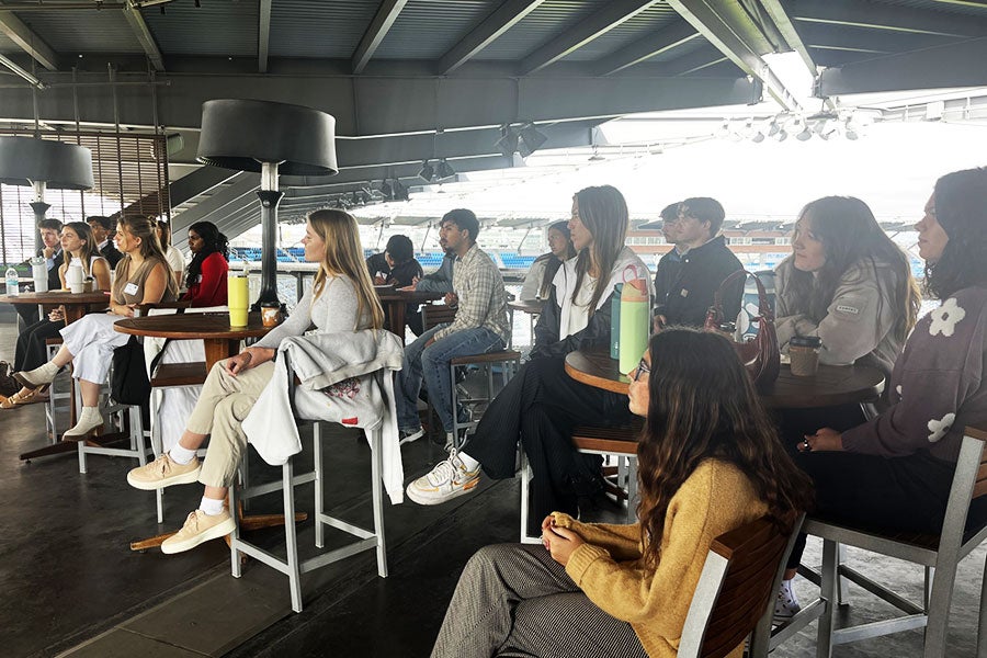Kinesiology students in attendance at the San Jose Earthquakes visit listen to professionals during a speaker panel talk.