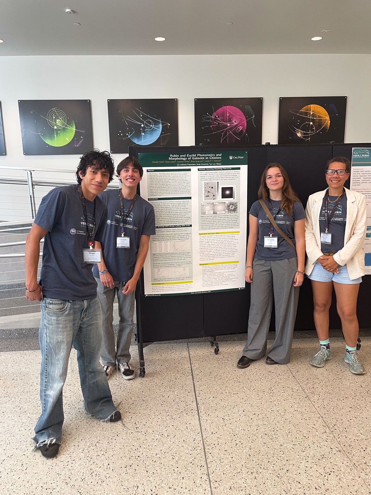 3 Cal Poly Physics majors stand alongside professor Louise Edwards in front of their research poster