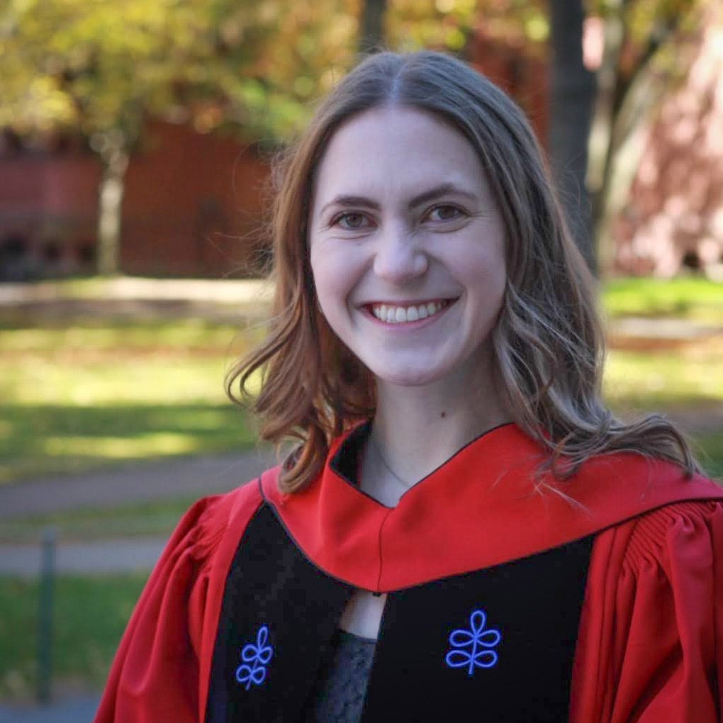 Frost Scholar alum Jenna Landy poses in a graduation gown.