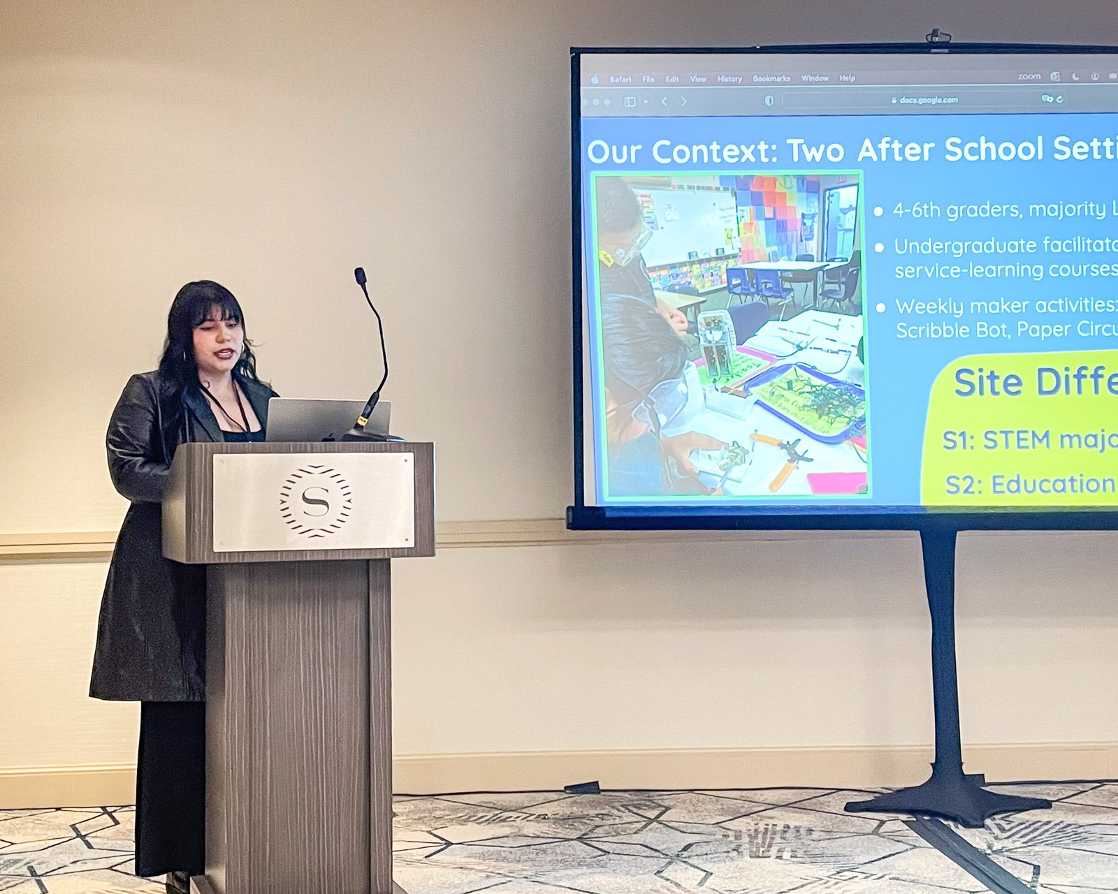Contreras presenting at a conference.