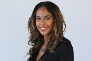 Portrait of Rebeka Moges, public health major and student researcher. 