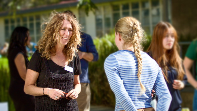 A Bailey College academic advisor shares information with a student.