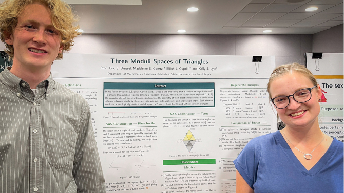 Mathematics students and Frost Research Scholars Elijah Guptil and Madeleine Goertz presenting their research poster.