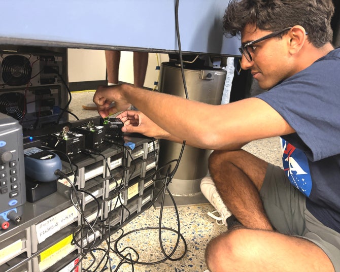 Summer Research Devansh Patel testing the mechanical shutter drivers of switching of the laser beams.